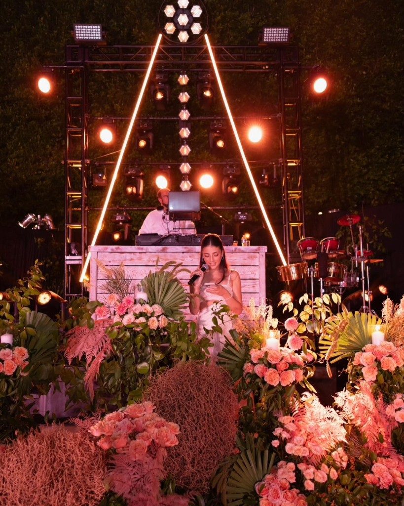 Luxury indoor venue with branded lighting and dance-floor projections