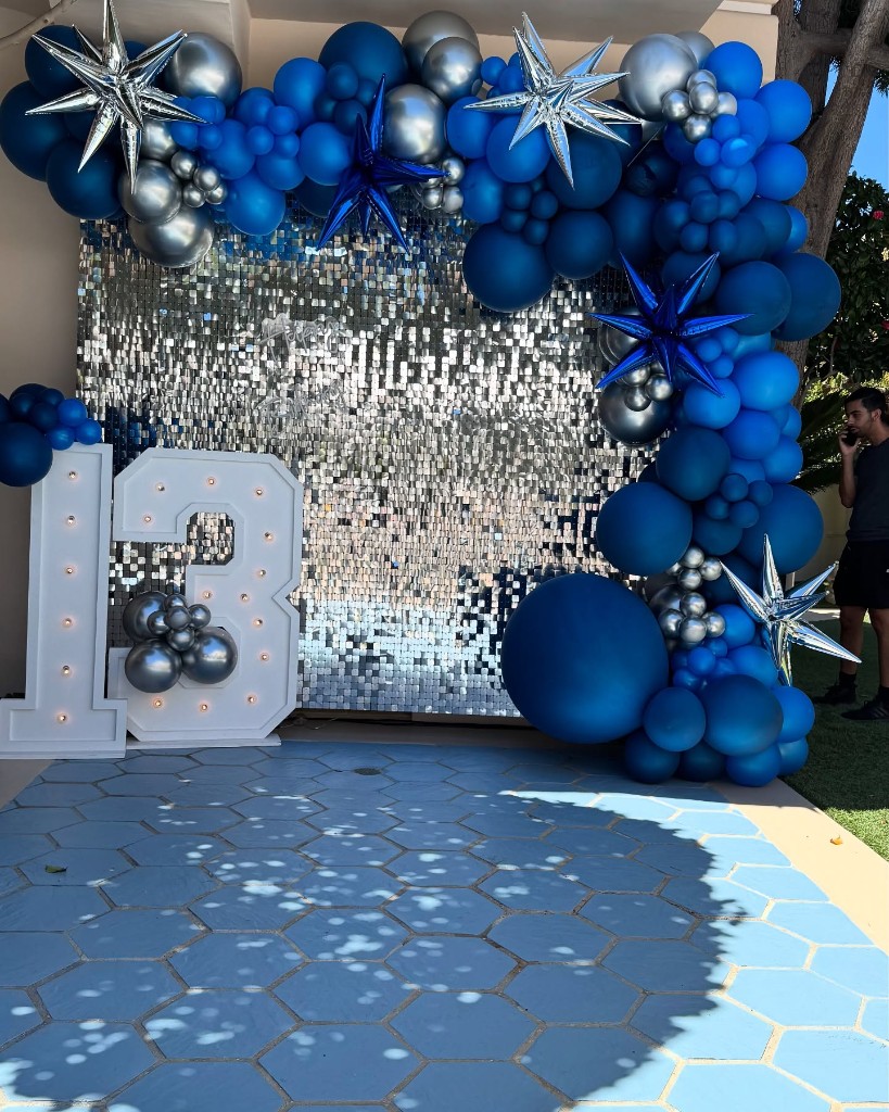 Lemon-themed outdoor dance floor and striped bar setup